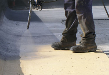 Coating systems over Philadelphia spray foam roof systems